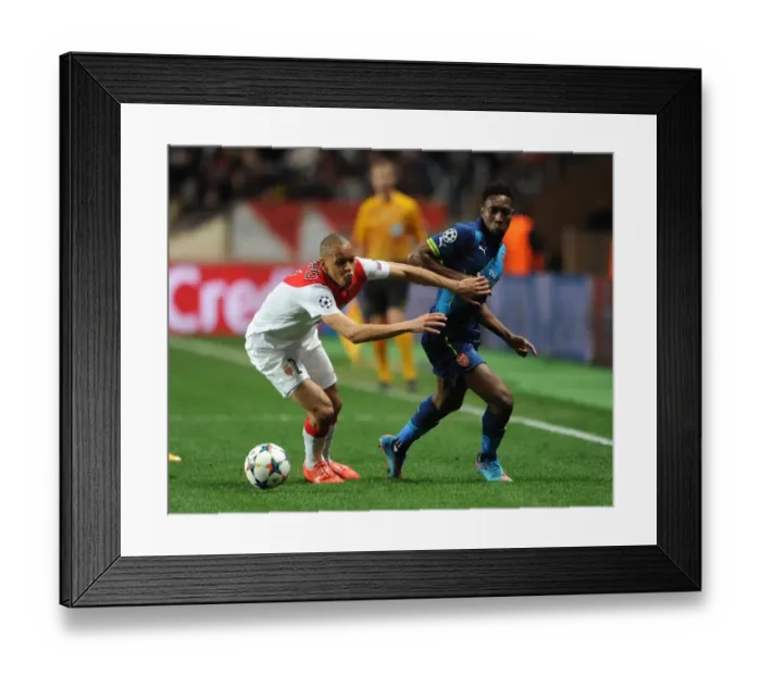 Framed Print : Danny Welbeck (Arsenal) Fabinho (Monaco). AS Monaco 0: 2 Arsenal. UEFA Champions League Framed Print : Danny Welbeck (Arsenal) Fabinho (Monaco). AS Monaco 0: 2 Arsenal. UEFA Champions League