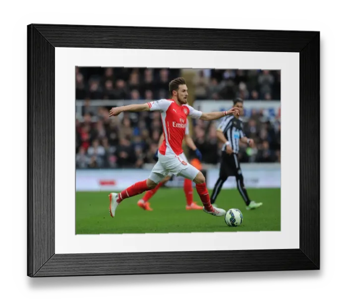 Framed Print : Aaron Ramsey in Action: Newcastle United vs. Arsenal, Premier League 2014-2015 Framed Print : Aaron Ramsey in Action: Newcastle United vs. Arsenal, Premier League 2014-2015