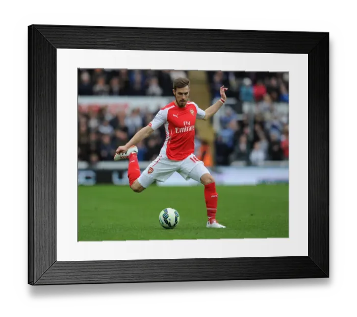 Framed Print : Ramsey in Action: Arsenal vs. Newcastle United, Premier League 2014-2015 Framed Print : Ramsey in Action: Arsenal vs. Newcastle United, Premier League 2014-2015