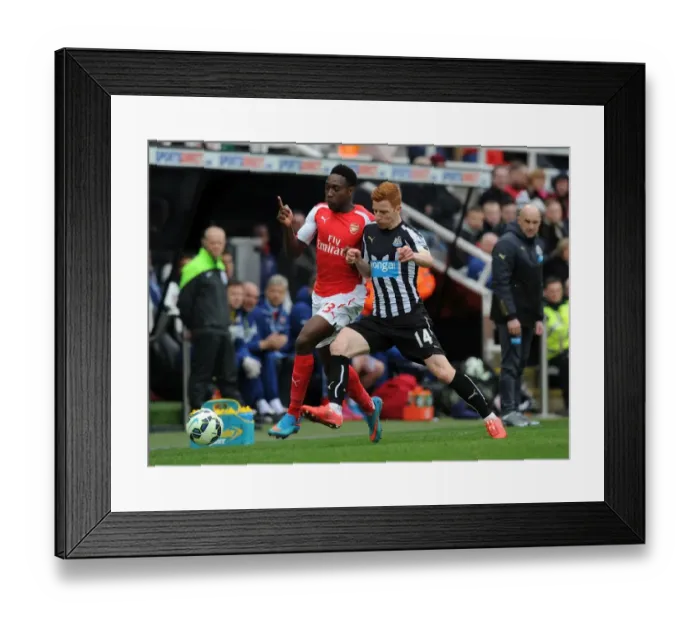 Framed Print : Welbeck vs Colback: Intense Battle in Newcastle United vs Arsenal Premier League Clash Framed Print : Welbeck vs Colback: Intense Battle in Newcastle United vs Arsenal Premier League Clash