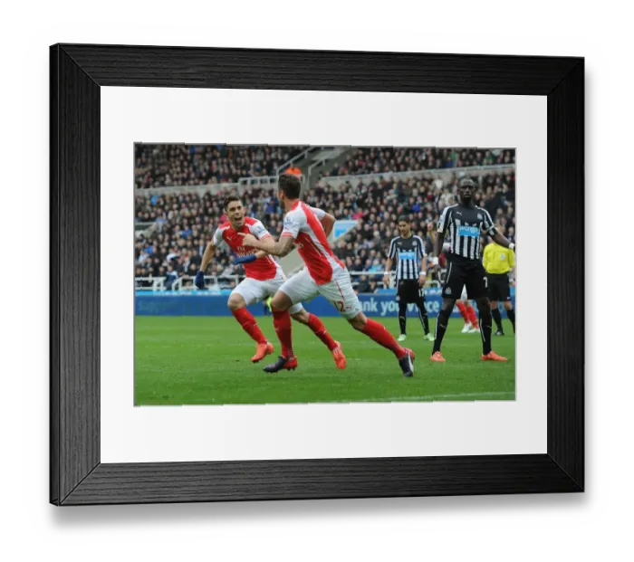 Framed Print : Giroud and Gabriel Celebrate Arsenal's Victory: Newcastle United vs Arsenal, Premier League 2014-2015 Framed Print : Giroud and Gabriel Celebrate Arsenal's Victory: Newcastle United vs Arsenal, Premier League 2014-2015
