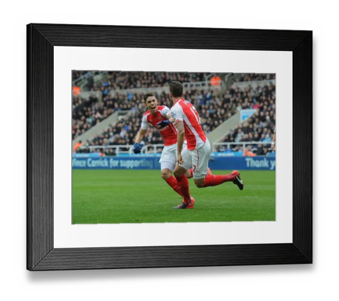 Framed Print : Arsenal's Unforgettable Victory: Giroud and Gabriel's Jubilant Moment (2015)