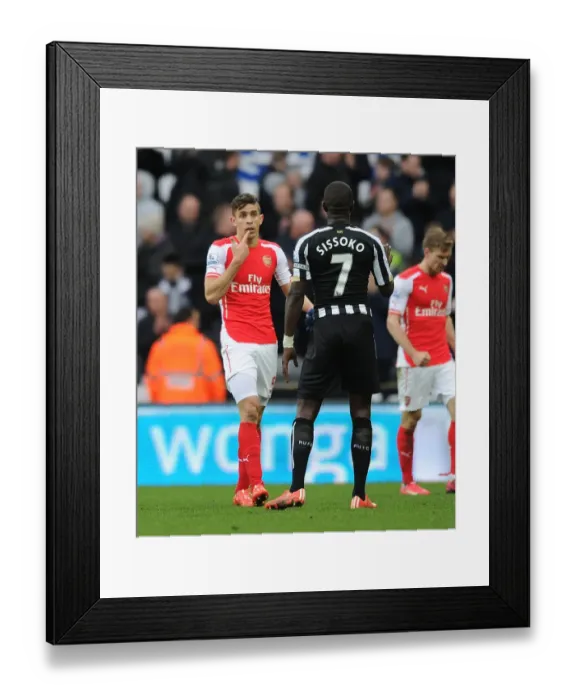 Framed Print : Gabriel Protests Moussa Sissoko Foul: Newcastle United vs Arsenal, Premier League 2014 / 15