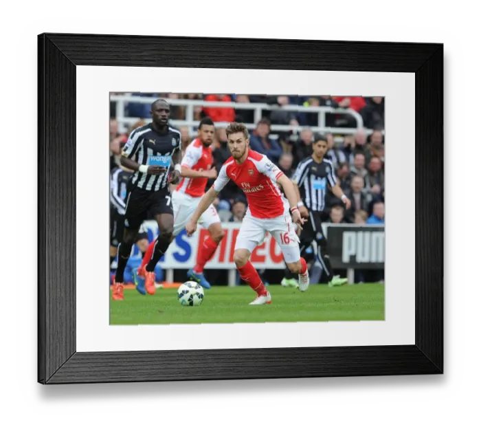 Framed Print : Aaron Ramsey in Action: Arsenal vs. Newcastle United, Premier League 2014 / 15 Framed Print : Aaron Ramsey in Action: Arsenal vs. Newcastle United, Premier League 2014 / 15