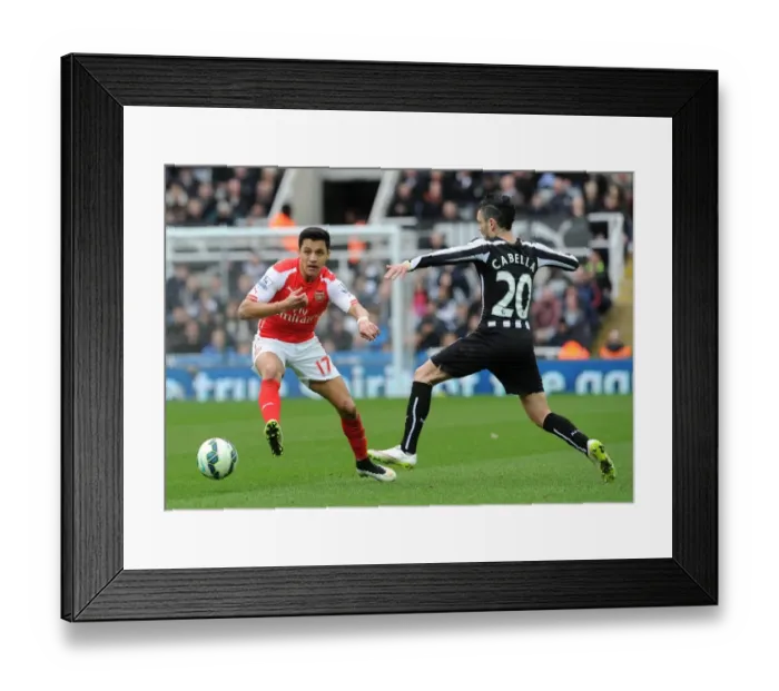 Framed Print : Clash of Wings: Sanchez vs. Cabella in Newcastle United vs. Arsenal