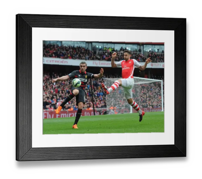 Framed Print : Giroud vs. Henderson: A Premier League Battle at Emirates Stadium