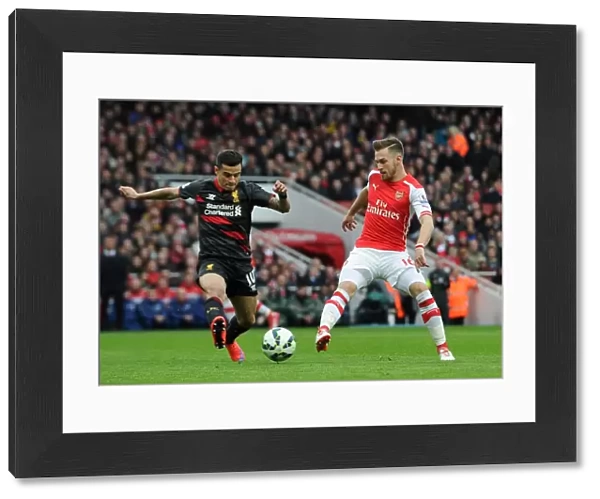 Aaron Ramsey (Arsenal) Philippe Countinho (Liverpool). Arsenal 4: 1 Liverpool. Barclays