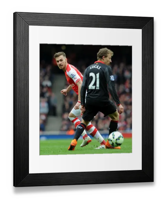 Framed Print : Ramsey vs. Leiva: A Battle of Wits in the Emirates - Arsenal vs. Liverpool, Premier League 2014-15