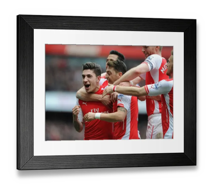 Framed Print : Mesut Ozil's Decisive Goal: Arsenal's Triumph over Liverpool (April 2015)