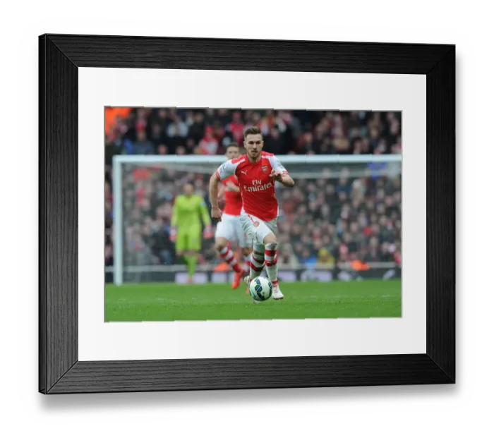 Framed Print : Arsenal's Aaron Ramsey in Action Against Liverpool, Premier League 2014-15 Framed Print : Arsenal's Aaron Ramsey in Action Against Liverpool, Premier League 2014-15