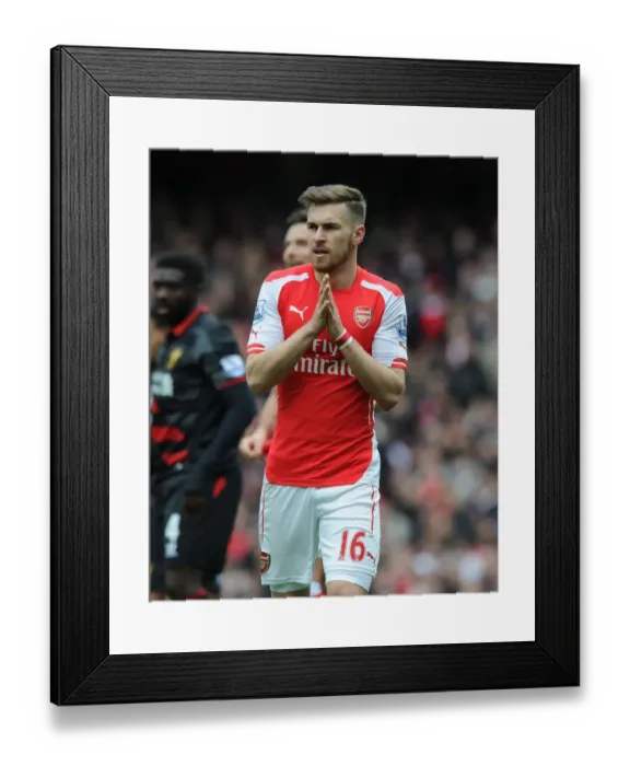 Framed Print : Arsenal's Aaron Ramsey Faces Off Against Liverpool in the Premier League 2014-15