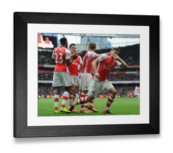Framed Print : Arsenal's Olivier Giroud Scores Fourth Goal in Thrilling Arsenal v Liverpool Match, 2014-15 Premier League