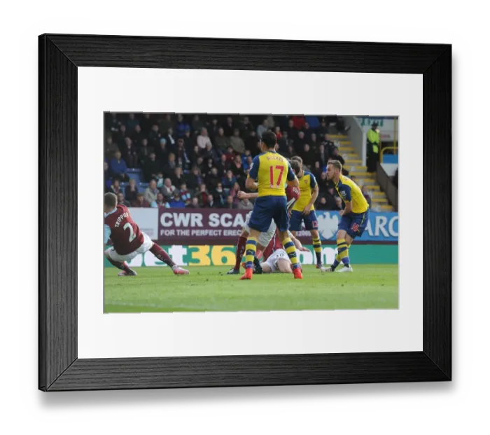 Framed Print : Ramsey Scores the Thrilling Winner: Burnley vs. Arsenal, Premier League 2014 / 15 Framed Print : Ramsey Scores the Thrilling Winner: Burnley vs. Arsenal, Premier League 2014 / 15