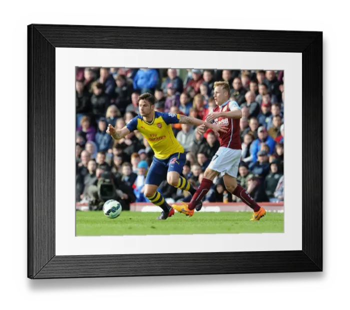 Framed Print : Giroud vs Arfield: A Premier League Battle at Turf Moor