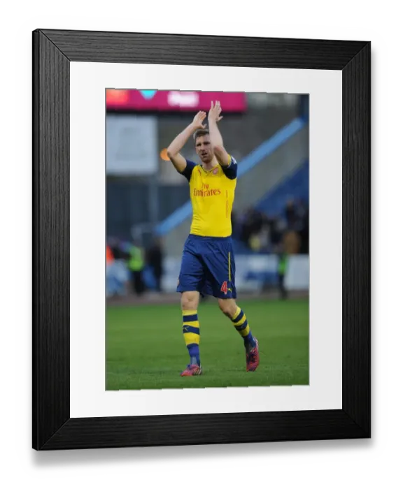 Framed Print : Per Mertesacker Celebrates with Arsenal Fans after Securing Victory against Burnley, 2015