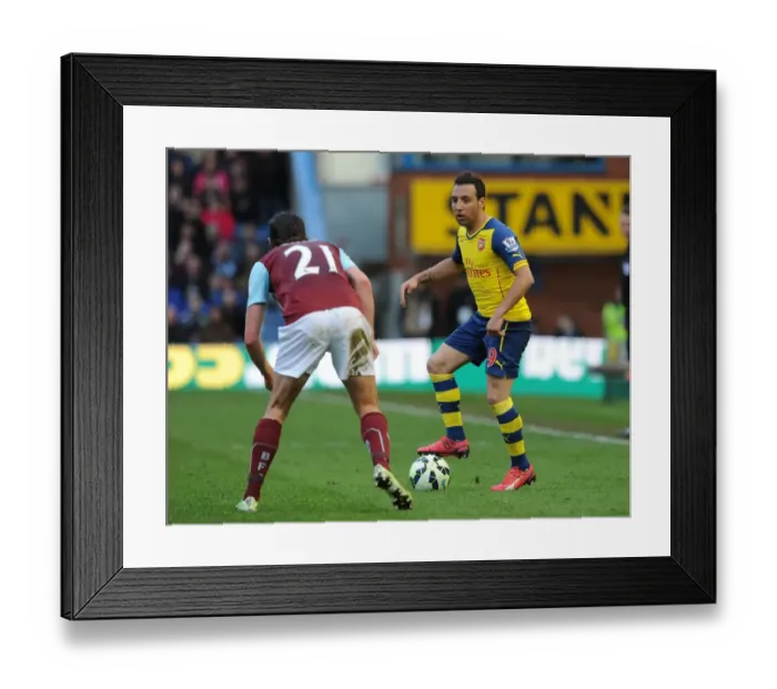 Framed Print : Santi Cazorla (Arsenal). George Boyd (Burnley). Burnley 0: 1 Arsenal. Barclays Premier League Framed Print : Santi Cazorla (Arsenal). George Boyd (Burnley). Burnley 0: 1 Arsenal. Barclays Premier League