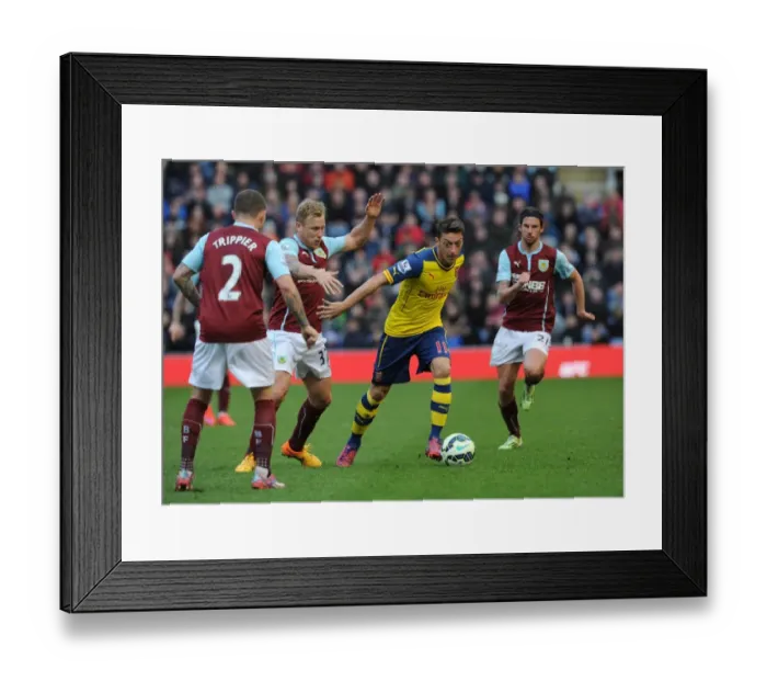 Framed Print : Mesut Ozil (Arsenal). Scott Arfield and Kieran Trippier (Burnley). Burnley 0: 1 Arsenal Framed Print : Mesut Ozil (Arsenal). Scott Arfield and Kieran Trippier (Burnley). Burnley 0: 1 Arsenal