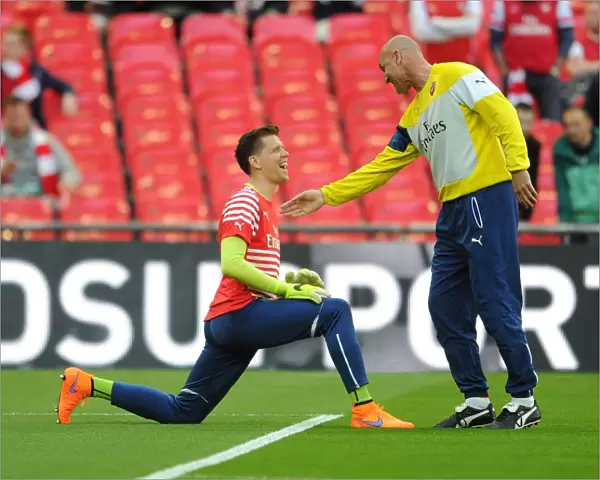Arsenal's Szczesny and Bould Share a Light-Hearted Moment Before FA Cup Semi-Final vs. Reading