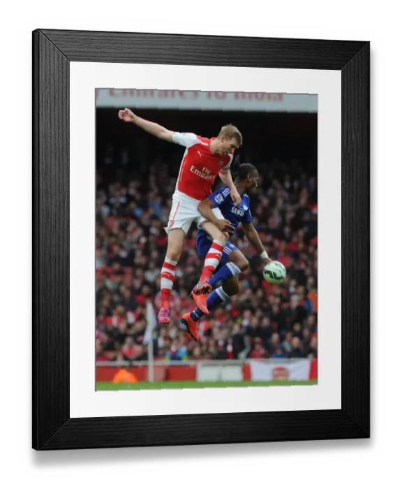 Framed Print : Clash of Titans: Mertesacker vs. Drogba - Arsenal vs. Chelsea Showdown