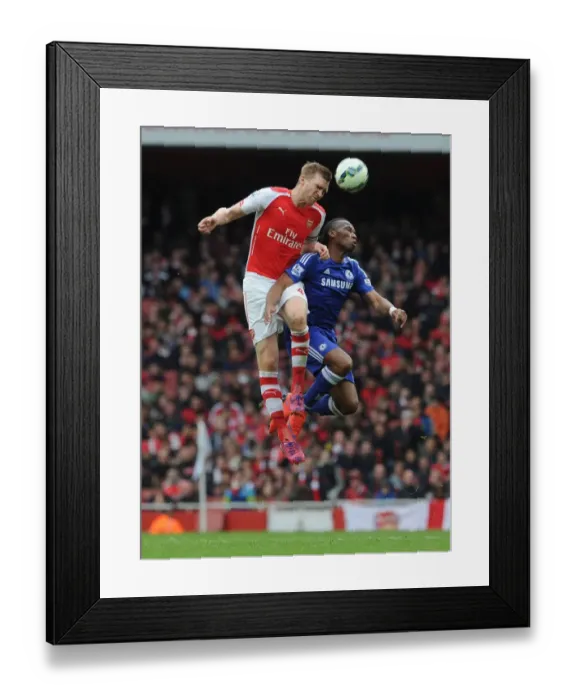 Framed Print : Clash of Titans: Mertesacker vs. Drogba - Arsenal vs. Chelsea (2014 / 15) Framed Print : Clash of Titans: Mertesacker vs. Drogba - Arsenal vs. Chelsea (2014 / 15)