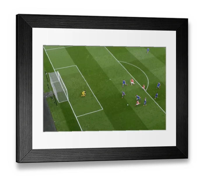 Framed Print : Mesut Ozil's Thrilling Breakthrough: Arsenal vs. Chelsea, Premier League 2014 / 15