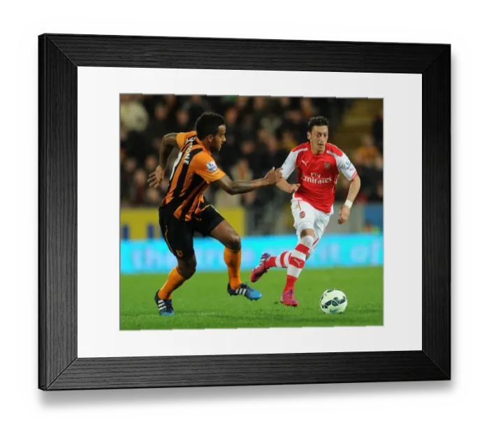 Framed Print : Mesut Ozil vs. Tom Huddlestone: A Premier League Battle at Hull City (2014 / 15) Framed Print : Mesut Ozil vs. Tom Huddlestone: A Premier League Battle at Hull City (2014 / 15)