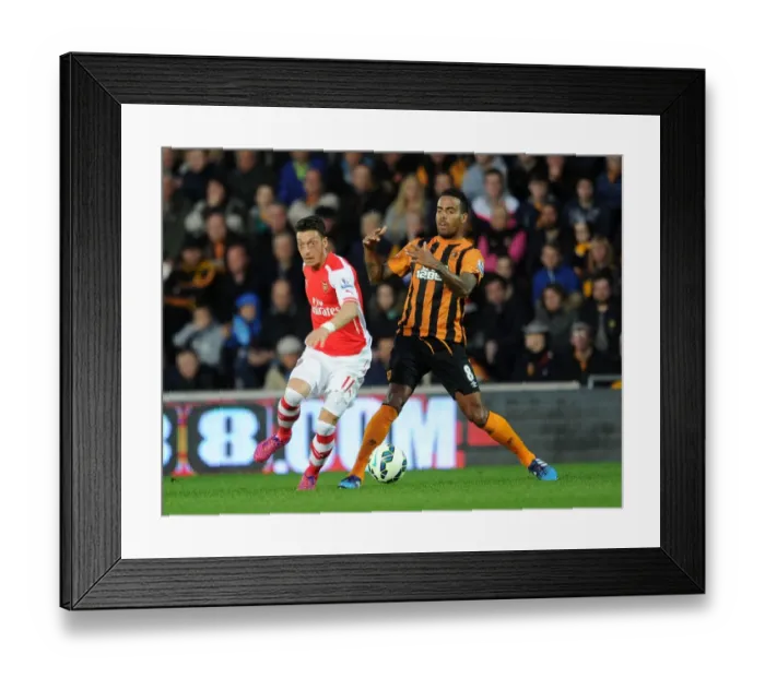 Framed Print : Mesut Ozil vs. Tom Huddlestone: A Premier League Battle at Hull City, 2014 / 15 Framed Print : Mesut Ozil vs. Tom Huddlestone: A Premier League Battle at Hull City, 2014 / 15