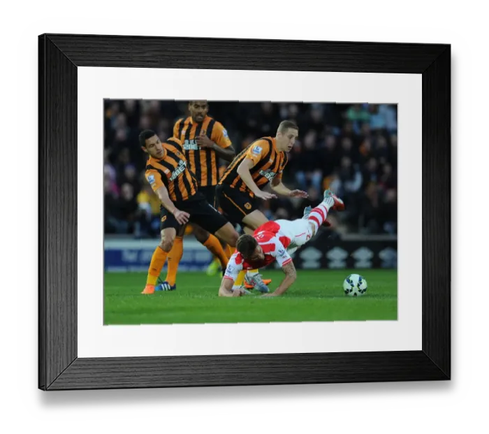 Framed Print : Clash at KC Stadium: Olivier Giroud vs. Hull City's Jake Livermore and Michael Dawson