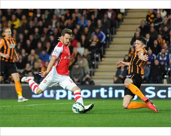 Aaron Ramsey scores Arsenals 2nd goal under pressure from Robbie Brady (Hull)