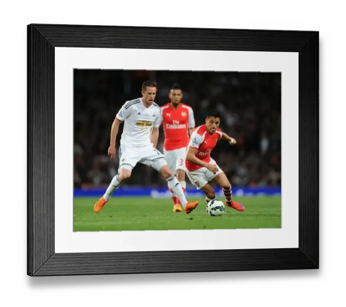 Framed Print : Alexis Sanchez Outsmarts Gylfi Sigurdsson: Arsenal vs Swansea, 2014 / 15 Premier League Framed Print : Alexis Sanchez Outsmarts Gylfi Sigurdsson: Arsenal vs Swansea, 2014 / 15 Premier League
