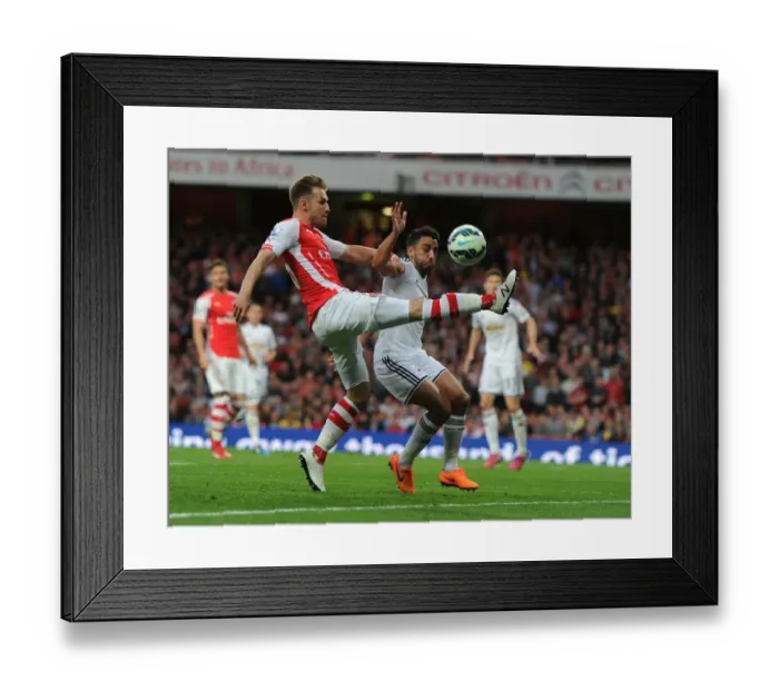 Framed Print : Ramsey vs Taylor: A Battle of Wills in the 2014 / 15 Arsenal vs Swansea Clash Framed Print : Ramsey vs Taylor: A Battle of Wills in the 2014 / 15 Arsenal vs Swansea Clash