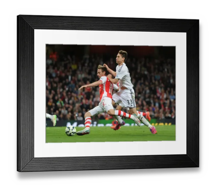 Framed Print : Monreal vs Fernandez: A Premier League Battle at Emirates Stadium (2014 / 15)