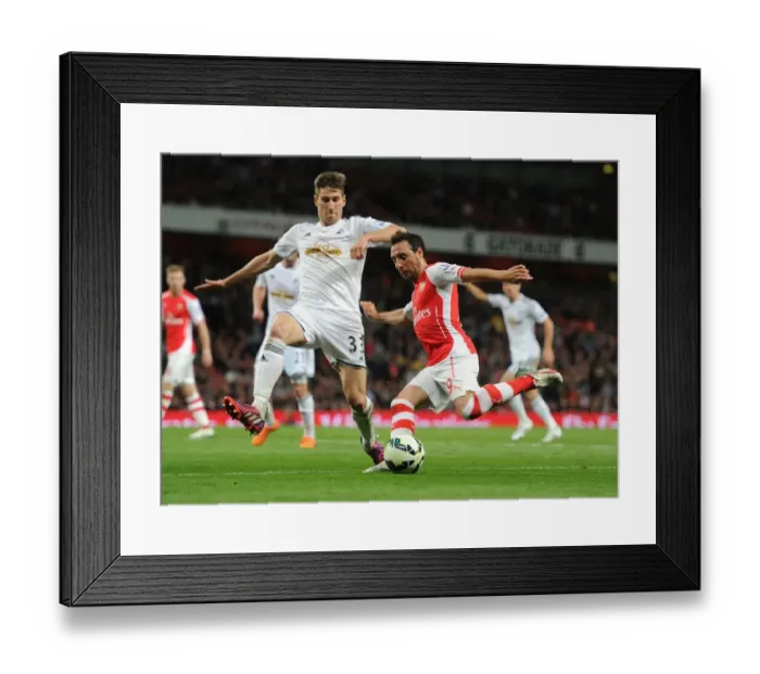 Framed Print : Clash at Emirates: Santi Cazorla vs Federico Fernandez - A Battle of Midfielders