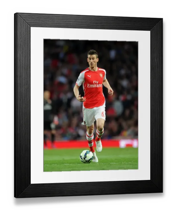 Framed Print : Laurent Koscielny: In Action for Arsenal Against Swansea City, Premier League 2014 / 15 Framed Print : Laurent Koscielny: In Action for Arsenal Against Swansea City, Premier League 2014 / 15