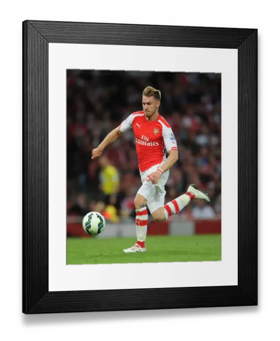 Framed Print : Aaron Ramsey in Action: Arsenal vs Swansea City, Premier League 2014-15 Framed Print : Aaron Ramsey in Action: Arsenal vs Swansea City, Premier League 2014-15