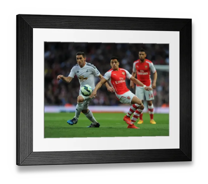 Framed Print : Sanchez vs. Rangel: A Premier League Battle at Emirates Framed Print : Sanchez vs. Rangel: A Premier League Battle at Emirates