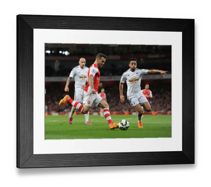 Framed Print : Clash of Midfielders: Jack Wilshere vs Neil Taylor - Arsenal vs Swansea City, Premier League 2014 / 15 Framed Print : Clash of Midfielders: Jack Wilshere vs Neil Taylor - Arsenal vs Swansea City, Premier League 2014 / 15