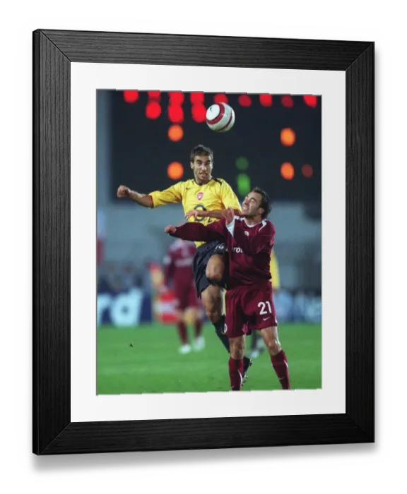 Framed Print : Arsenal's Flamini Scores Twice in 0:2 Victory over Sparta Prague in Champions League Group B