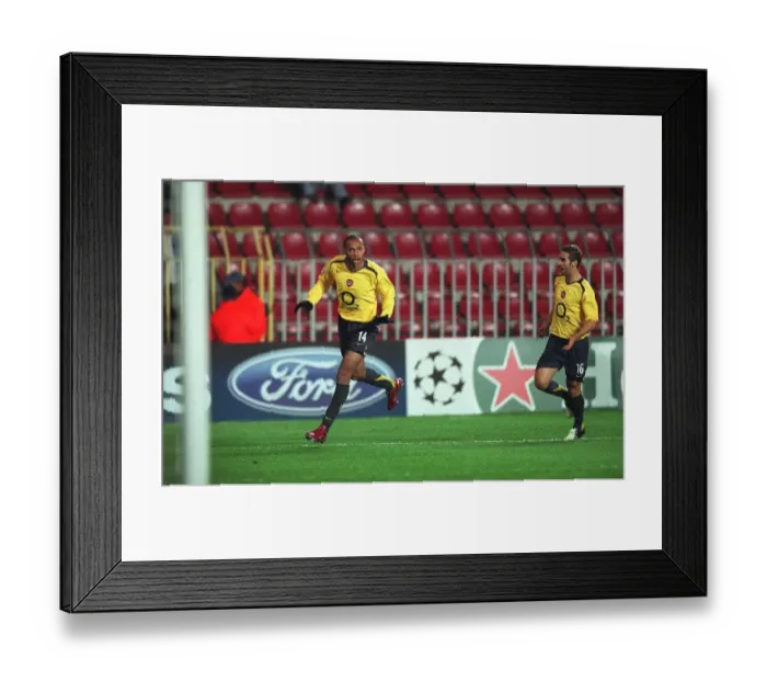 Framed Print : Thierry Henry's Stunner: Arsenal's Unforgettable First Goal vs. Sparta Prague in the UEFA Champions League Framed Print : Thierry Henry's Stunner: Arsenal's Unforgettable First Goal vs. Sparta Prague in the UEFA Champions League