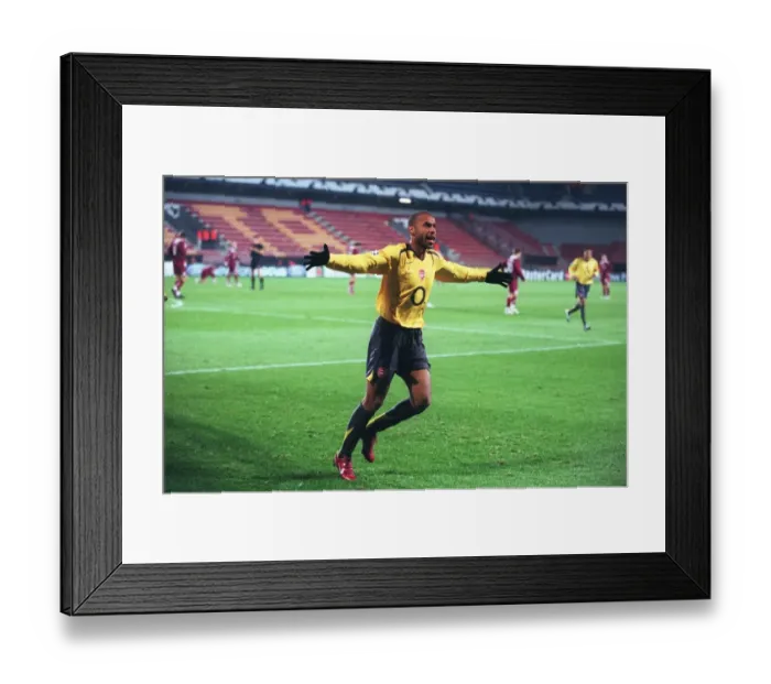 Framed Print : Thierry Henry's Euphoric First Goal: Arsenal's Unstoppable Start in UEFA Champions League vs. Sparta Prague