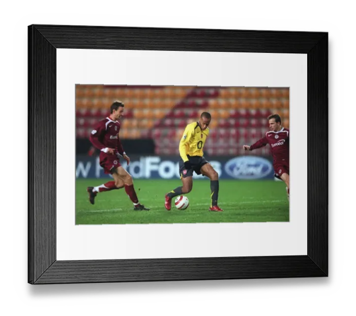 Framed Print : Thierry Henry: Arsenal's Record-Breaking Legend - Scores 187th Goal Against Sparta Prague in Champions League Framed Print : Thierry Henry: Arsenal's Record-Breaking Legend - Scores 187th Goal Against Sparta Prague in Champions League