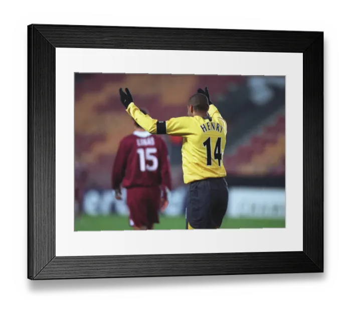 Framed Print : Thierry Henry: Shattering Arsenal's Record with Goal Number 186 (2005) - Arsenal's Legendary Striker Becomes the Club's All-Time Leading Goalscorer in UEFA Champions League Match against Sparta Prague Framed Print : Thierry Henry: Shattering Arsenal's Record with Goal Number 186 (2005) - Arsenal's Legendary Striker Becomes the Club's All-Time Leading Goalscorer in UEFA Champions League Match against Sparta Prague
