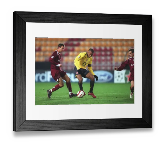 Framed Print : Thierry Henry: Arsenal's Legendary Striker Breaks Record with Double against Sparta Prague in the Champions League (186 Goals)