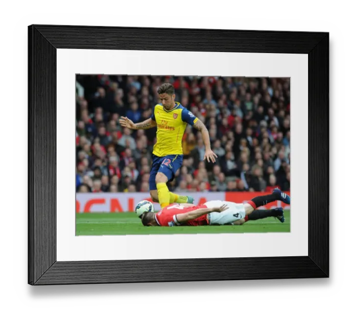 Framed Print : Intense Rivalry: Giroud vs Jones at Old Trafford - Manchester United vs Arsenal, Premier League 2014-15