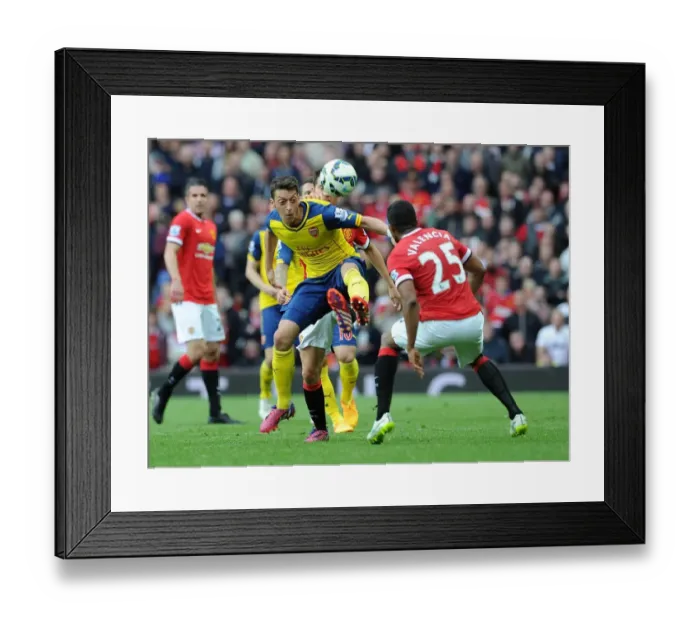 Framed Print : Mesut Ozil Under Pressure: Herrera and Valencia Harass Arsenal Star in Manchester United vs Arsenal Clash (2014-15) Framed Print : Mesut Ozil Under Pressure: Herrera and Valencia Harass Arsenal Star in Manchester United vs Arsenal Clash (2014-15)