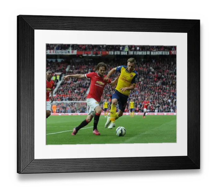 Framed Print : Ramsey vs. Blind: Clash at Old Trafford - Premier League Showdown