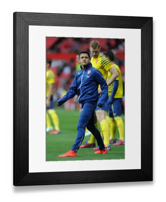 Framed Print : Gearing Up for Battle: Alexis Sanchez Prepares for Manchester United vs Arsenal, Premier League 2014-15 Framed Print : Gearing Up for Battle: Alexis Sanchez Prepares for Manchester United vs Arsenal, Premier League 2014-15