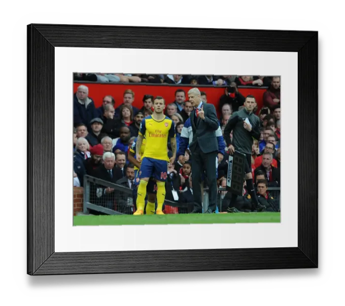 Framed Print : Arsene Wenger Guides Jack Wilshere: Arsenal's Managerial Moment at Old Trafford (2014-15) Framed Print : Arsene Wenger Guides Jack Wilshere: Arsenal's Managerial Moment at Old Trafford (2014-15)