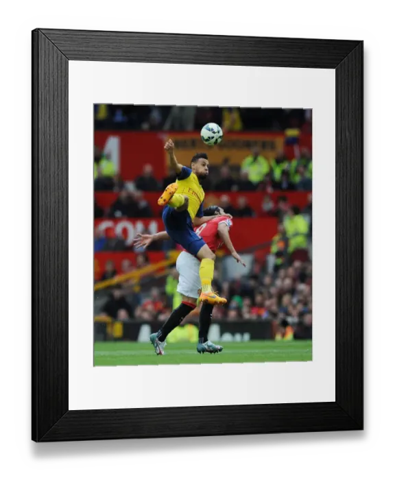 Framed Print : Coquelin Soars Over Falcao: Manchester United vs. Arsenal, Premier League 2014-15