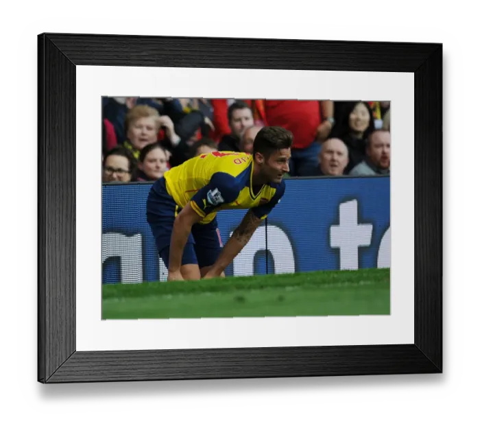 Framed Print : Arsenal's Olivier Giroud Faces Off Against Manchester United in Premier League Clash, 2014-15